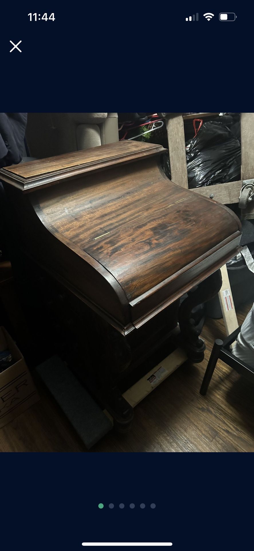 Antique roll like desk with hidden cabinet that pops up in great condition asking  100 need gone asap cleaning house 
