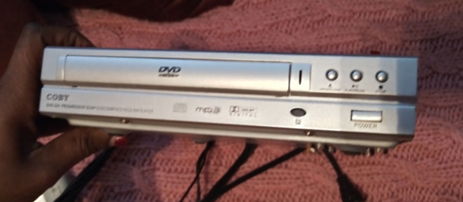 Sony DVD player with cords and remote control