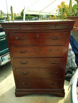 Nice looking cherry wood all drawers work good one drawer needs a new handle