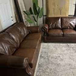 Genuine leather couch and love seat set, delivery available 