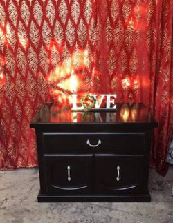TV stand or microwave cart colors black gloss and silver has been refurbished no scratches