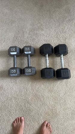 (2) 30 pounds and (2) 25 pounds dumbbells