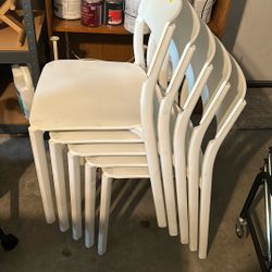 5 white Chairs 