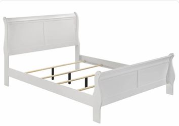 Full-size Casper mattress, foundation base, and white sleigh-style bed frame