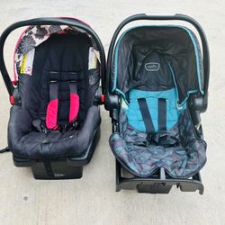 2 baby seats graco and evenflo pink and green