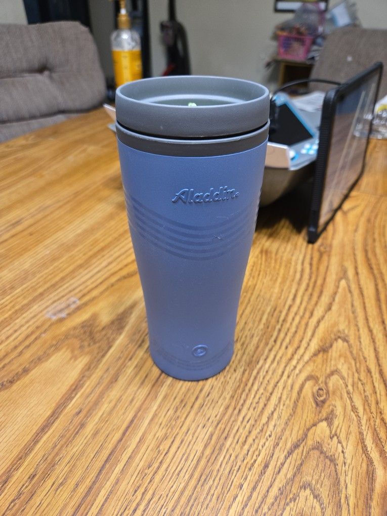 Alladin. Blue Travel Cup. 16 Oz. Gently Used. Nothing Wrong With It.