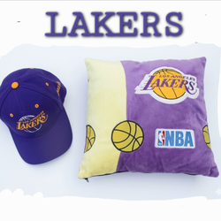 RARE VINTAGE LOS ANGELES LAKERS 1990's PURPLE/ GOLD SNAPBACK HAT AND PLUSH PILLOW.