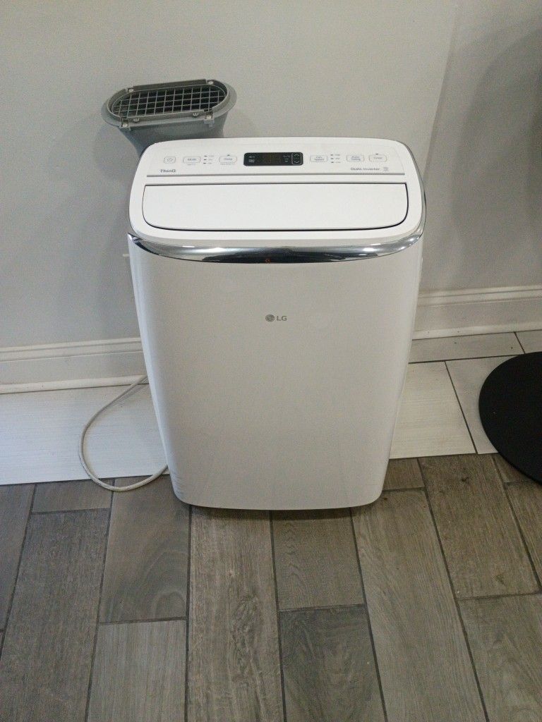 PRICE REDUCTION!!!    LG ThinQ Portable Air Conditioner With Dual Inverter And Wi-Fi Connectivity Practically New
