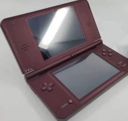 burgundy dsi xl  with carrying case. inside case there are 2 stylist pens and a screen protector and also comes with 4 games