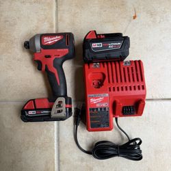 Milwaukee 1/4” Brushless Impact Drill. 2CP Battery. XcC 5.0 Battery And Charger 