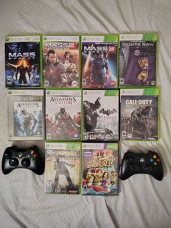 2 Xbox 360 controllers and Games