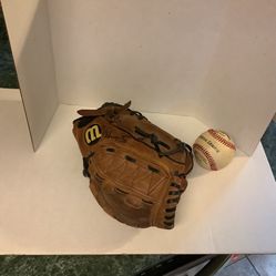 Wilson A440 fast-pitch leather baseball glove, 11” catch with right hand throw with left.  Adjustable wrist for correct and secure fit, correctly brok