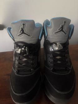 Jordan 4 Black University Blue