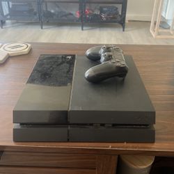 PS4 with controller 