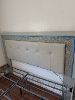 King size bed frame, side table, and dresser with vanity mirror