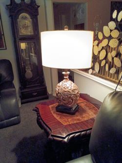 gold lamps with mirrored swirl designs