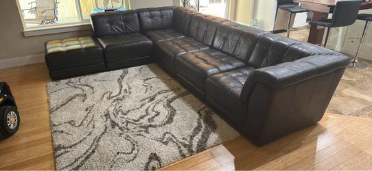 Dark brown large leather sectional sofa