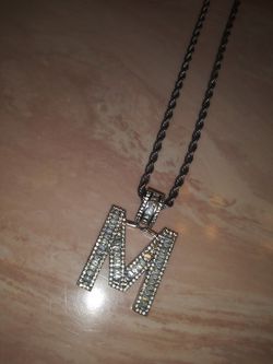 Iced out M pendant and chain
