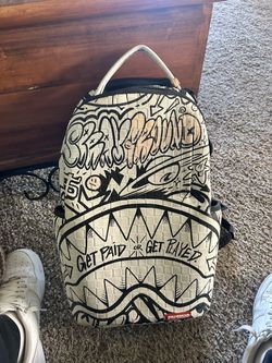 Authentic Sprayground Shark backpack - "GET PAID OR GET PLAYED" graffiti/ tagged up edition in white.
