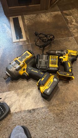 Dwalt impact wrench and hammer drill. Battery and charger