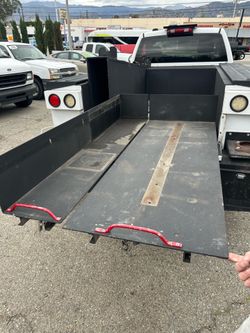 Heavy duty truck bed slide