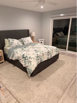 Queen Bed w/ hidden storage drawer. Ready to go!