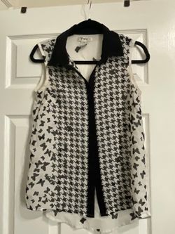 Pinky sleeveless butterfly and houndstooth blouse
