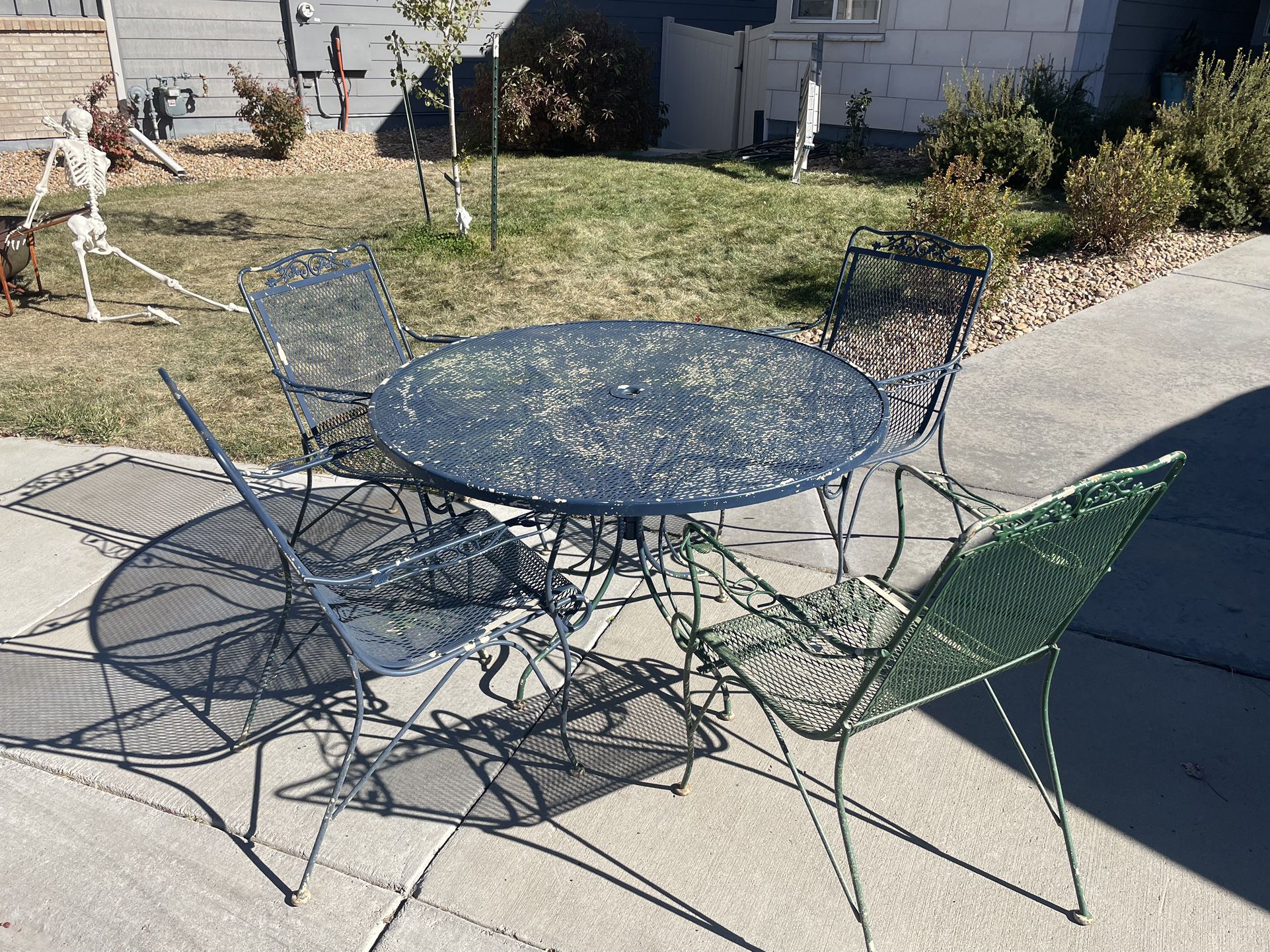 Antique Patio Table And 4 Chairs 