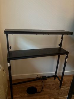 Narrow console table with adjustable height
