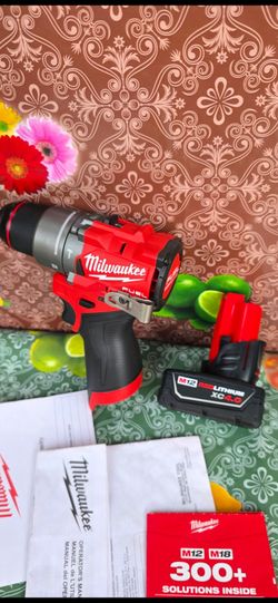 MILWAUKEE M12 FUEL 12-VOLT LITHIUM ION BRUSHLESS CORDLESS GEN-4  1/2 IN. 
HAMMER DRILL  WITH HIGH CAPACITY 4.0AH BATTERY