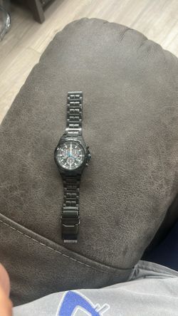 Citizen Eco-Drive wristwatch, specifically model BL5405-59E