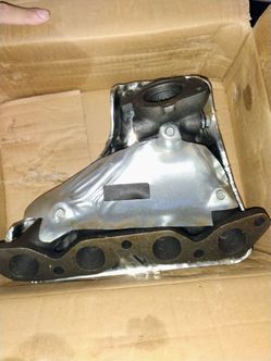 New Exhaust Manifold with Heat Shield Ford Geo prizm 1989 through 1997