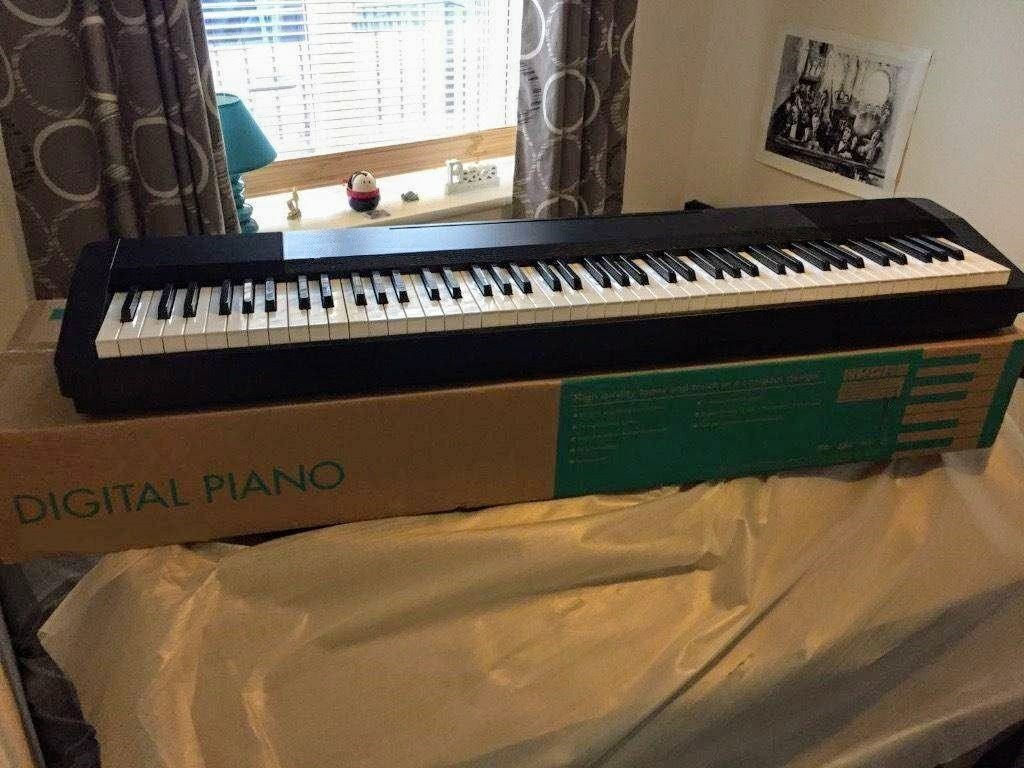 Digital Piano with Stand and 88 Weighted Keys; $200 off to a good home