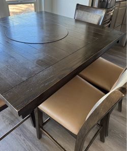 Dinning table with 4 chairs and a bench