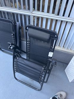2 recliner beach chairs