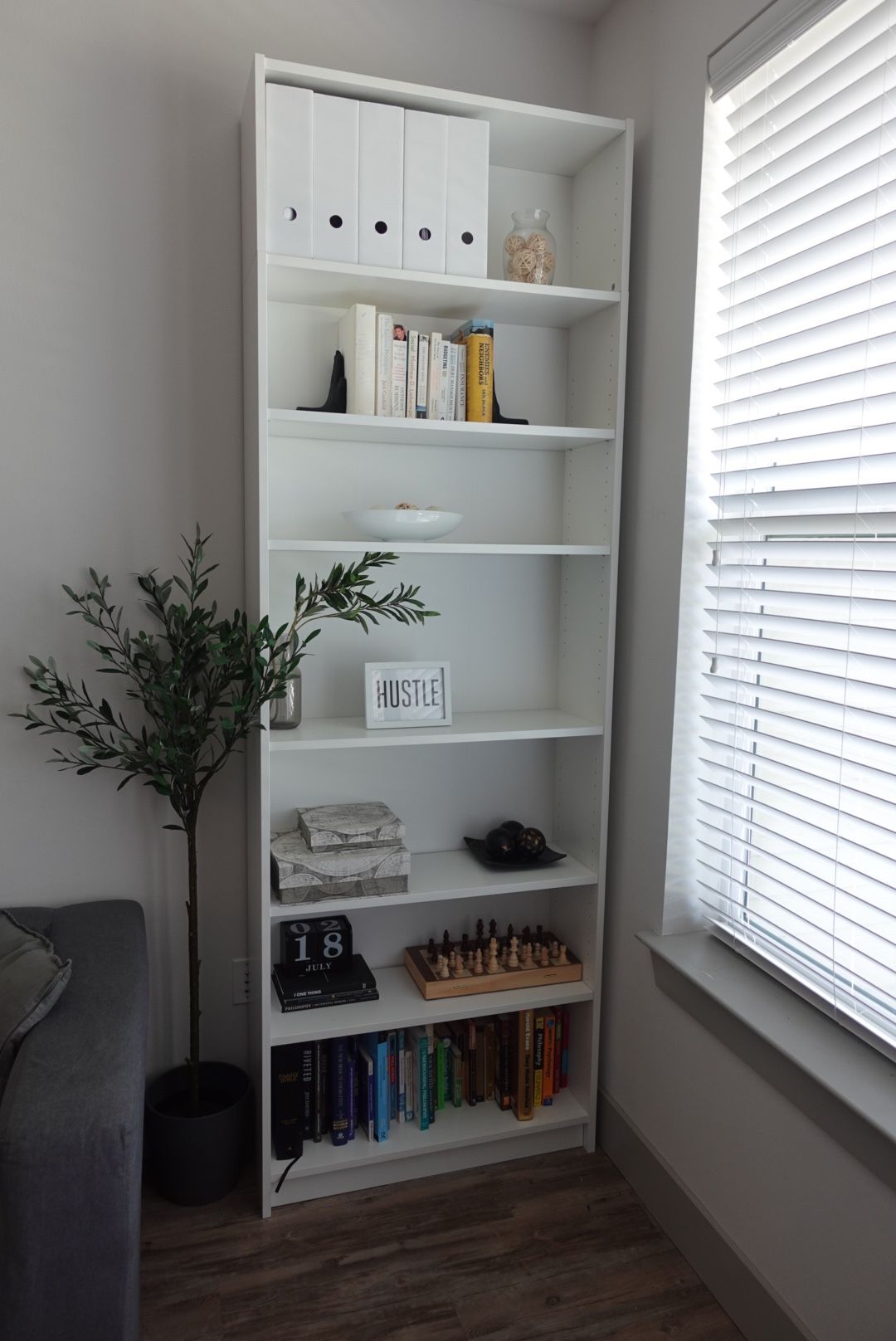 White IKEA billy bookcase with height extension unit