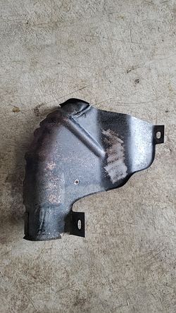 Datsun 510 wagon filler tube shield