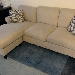 7 Foot Couch With Reversible Chaise