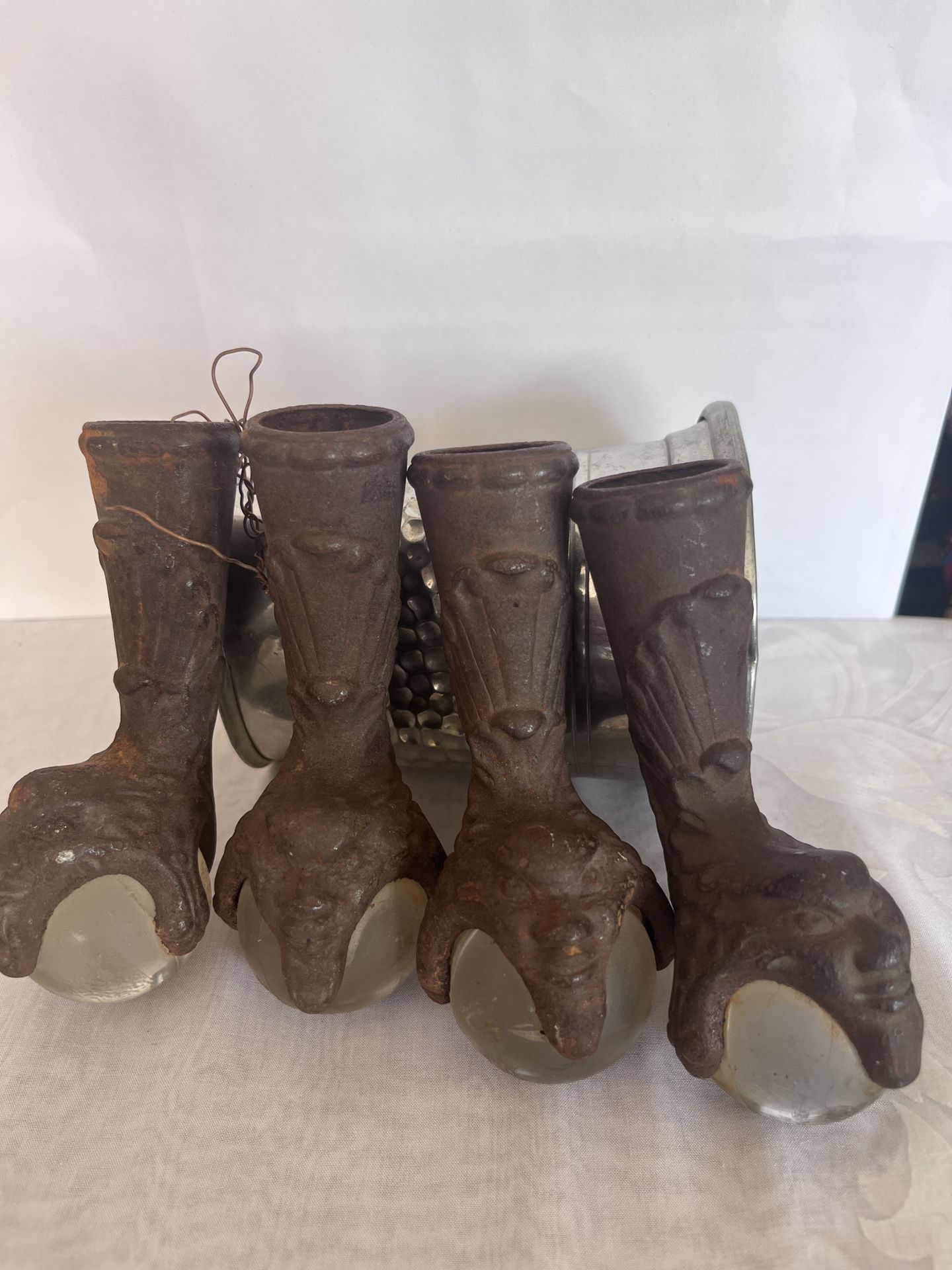 antique cast iron Northwind claw feet ball bottoms.