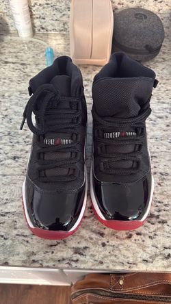Air Jordan 11 Retro Bred Sneakers