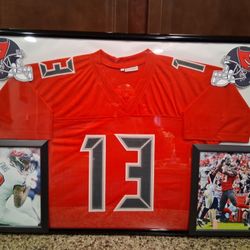 MIKE EVANS WITH THE TAMPA BAY BUCCANEERS STITCHED,FRAMED JERSEY.