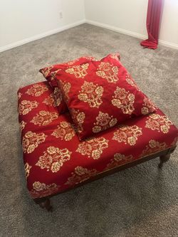 Large ottoman with pillows
