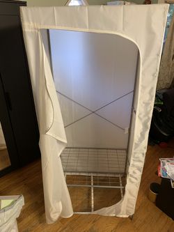 Ikea clothes hanger w/ white plastic wrap