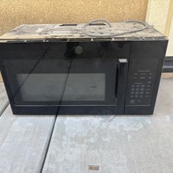 LG above the Stove Microwave 