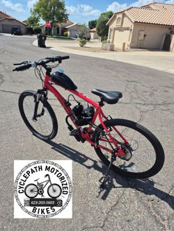 Mountain bike gas bike motorized bicycle delivery available for a fee