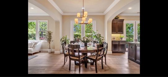Large Wood Round Dining Table with 6 Matching Upholstered Chairs