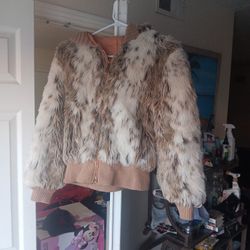 Size Smal Hoodie Jacket says Dry Clean Furrier Method