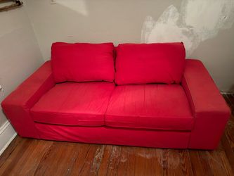 Red sofa and foot stool