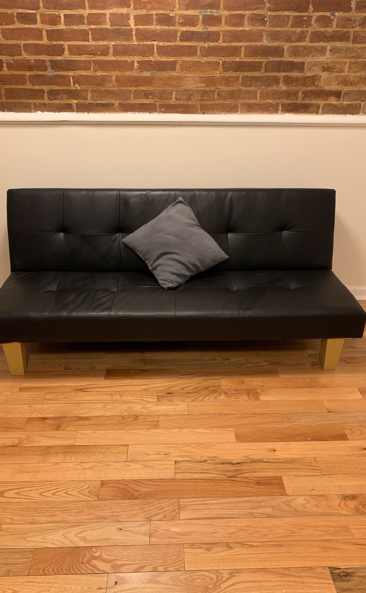 Faux leather black convertible sofa / futon