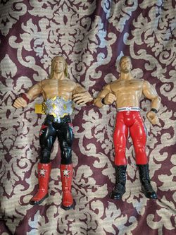 Edge and Christian Jaks action figures